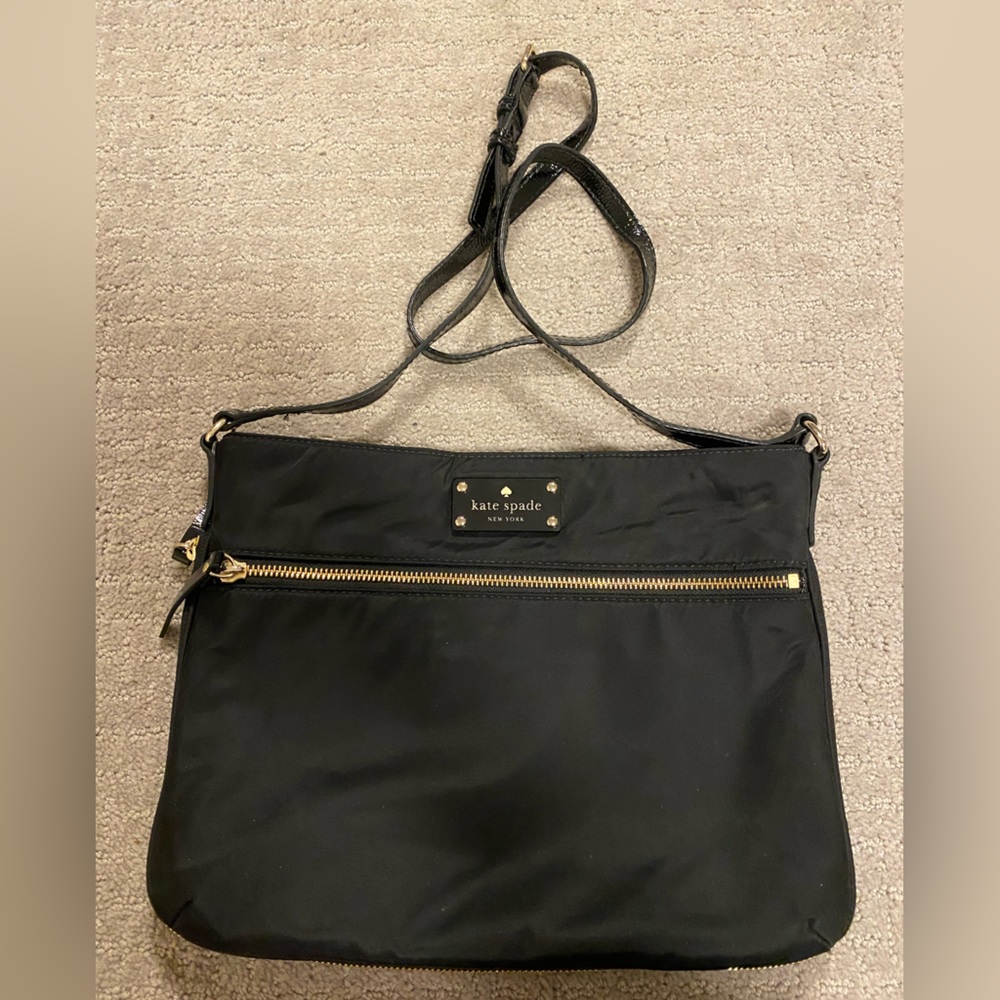 Kate Spade crossbody nylon bag with patent leather strap.